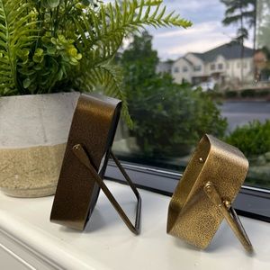 Two picture frames. Brass details